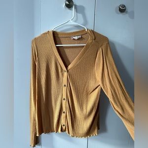 Mustard yellow long sleeve top with buttons